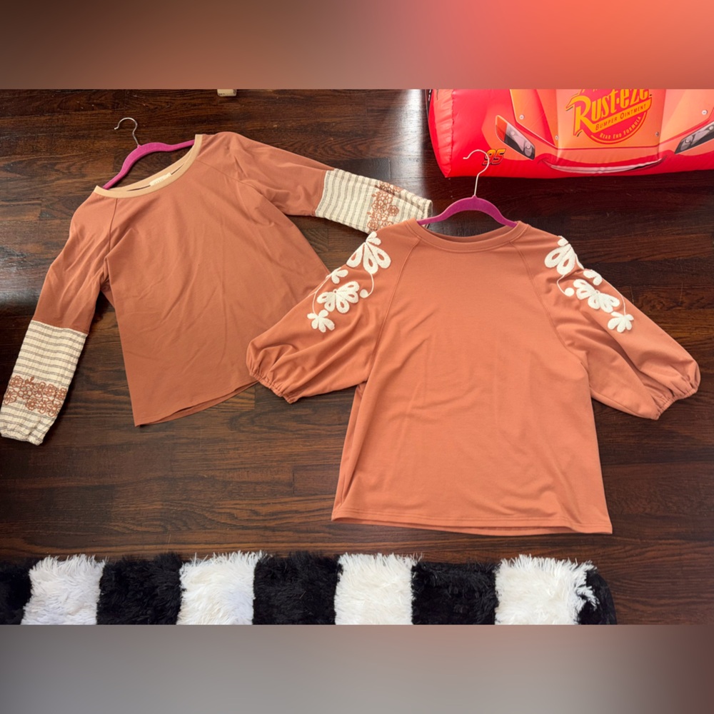 Two pink cute fall women’s tops.